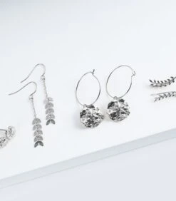 Geurkaars Kokosnoot Met Zilveren Oorbellen -INNO WINKEL 26a7ce70540641e3beb51df666004979